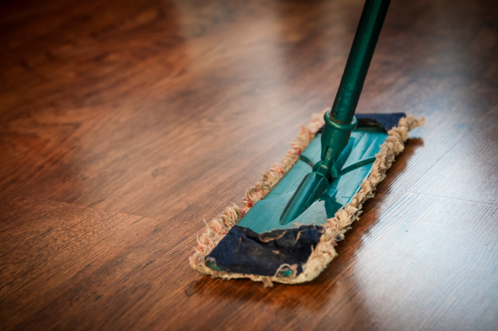 a mop on wooden floor