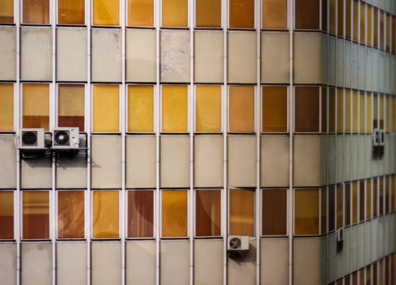 building with AC units